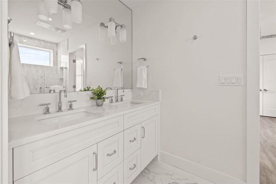 Even the guest bathrooms that are adjacent to the bedrooms have double sinks!