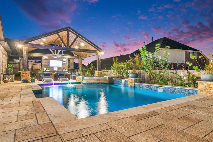 Approximately 1,326 sq. ft. of decked outdoor space surrounding the pool and under the patio