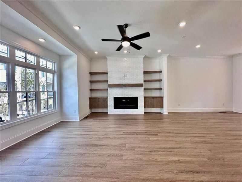 Linear fireplace complete with mantle stained to coordinate to match your floors