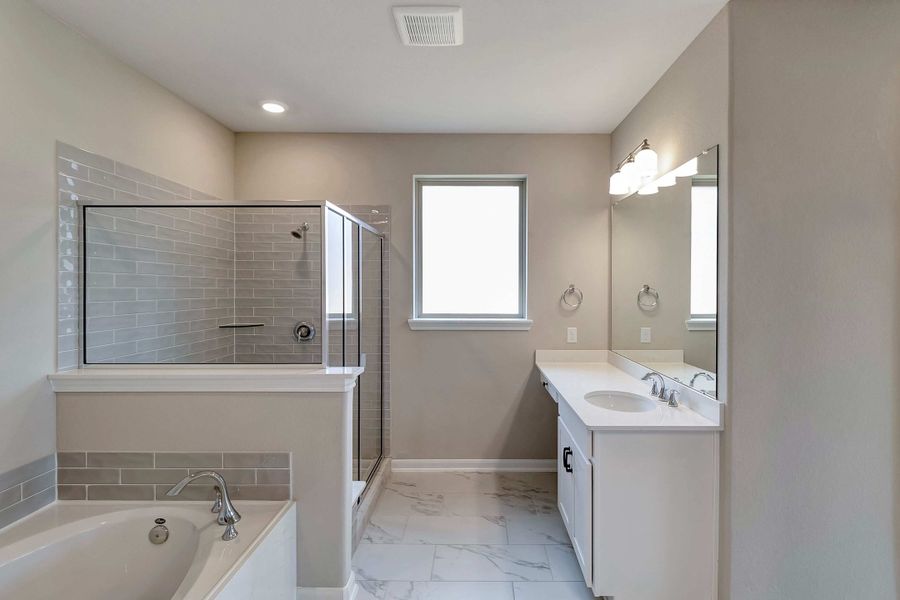 Primary bath. Note: Sample product photo - actual exterior and interior selections may vary by homesite