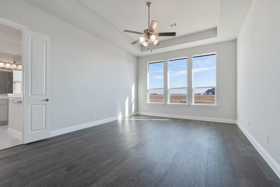 Primary Bedroom | Concept 2406 at Hidden Creek Estates in Van Alstyne, TX by Landsea Homes