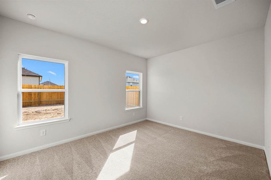 Primary bedroom, large enough for the king-sized bed!