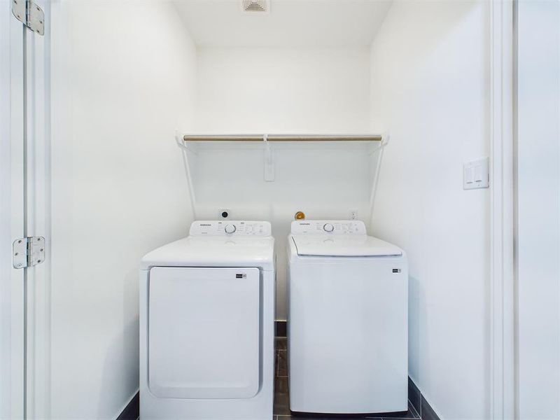 Laundry room convenintly located in the second floor!