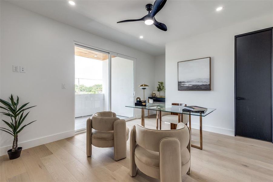 Office featuring light wood-type flooring and ceiling fan