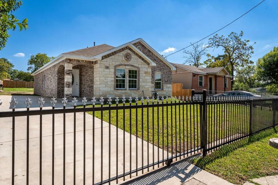 Great curb appeal with privacy driveway.