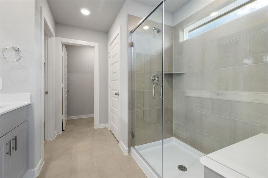 Step into the epitome of spa-like luxury with an oversized walk-in shower that redefines indulgence.