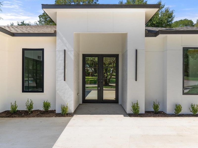 Entrance to property with french doors