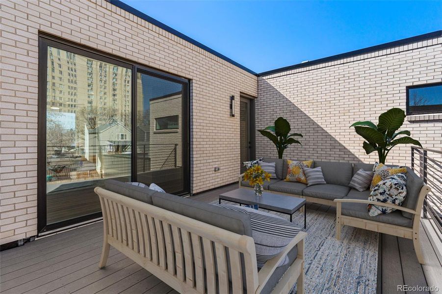 The Primary sliding doors open up to the 2nd level deck, perfect for unwinding with a glass of wine after a busy day.Virtually staged.