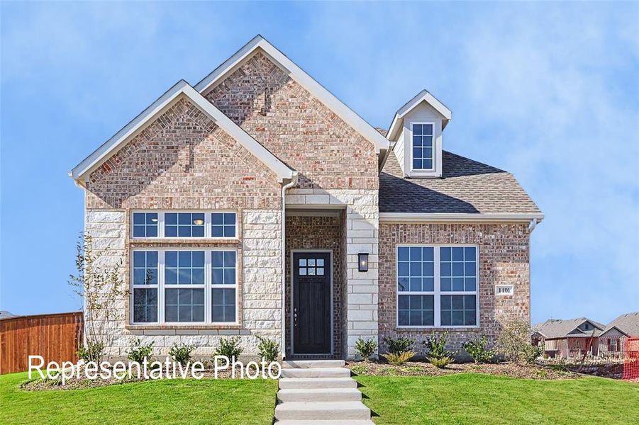 View of front of property with a front lawn