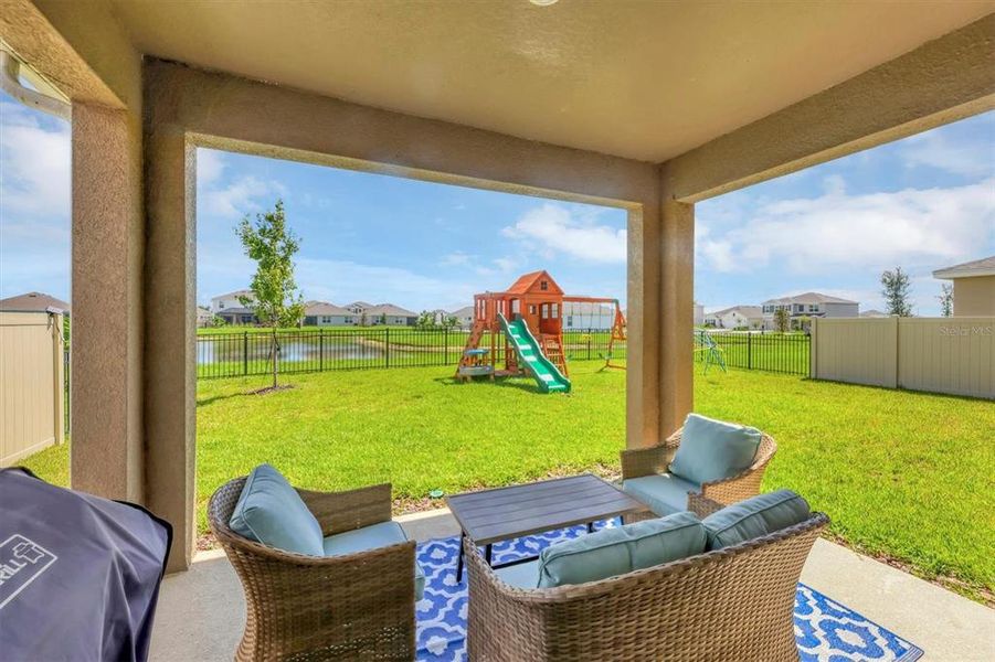 The covered lanain and fenced in yard offer a perfect place to relax and enjoy the Florida sunshine!  Bring the pups!