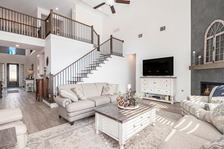 Main Living Area with  finished wood stairs with accent lights for nighttime safety