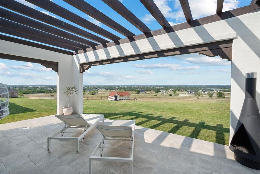 View of patio featuring a pergola