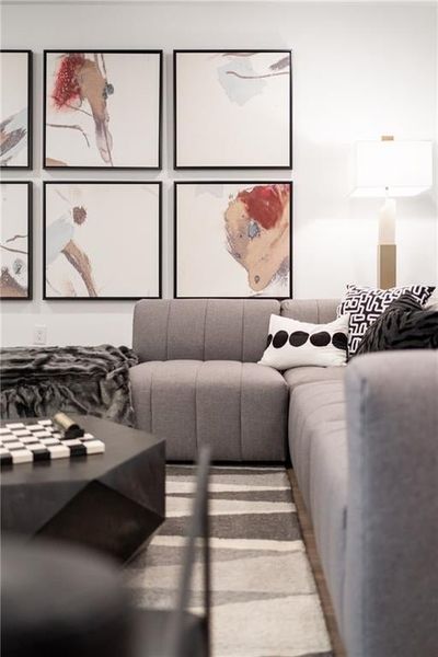 Living room with hardwood / wood-style flooring