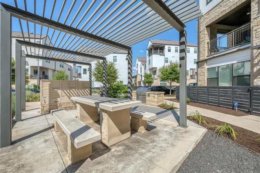 Step outside to the grill and picnic area conveniently located right in front of the unit, perfect for hosting outdoor gatherings with friends and neighbors
