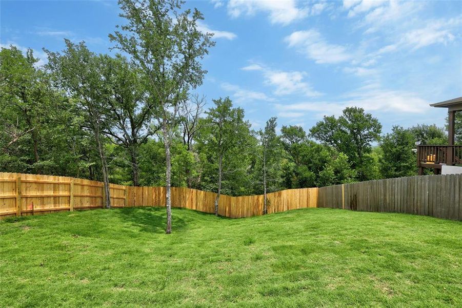 The back of the property goes beyond the privacy fence in the back.