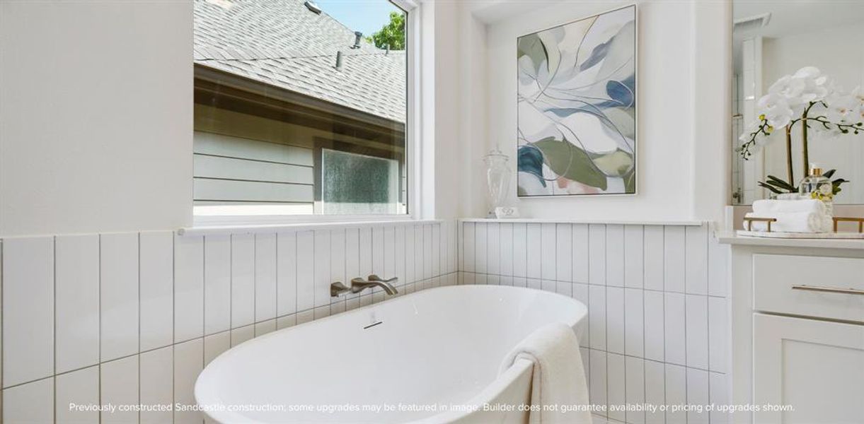 Soak in Serenity: End your days or start your weekends enveloped in the embrace of a luxurious soaking tub in this exquisitely designed primary bathroom.