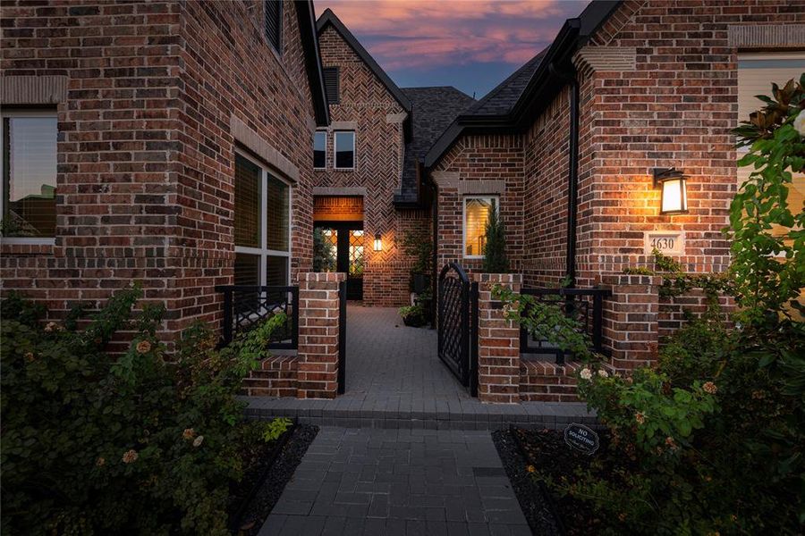 View of exterior entry at dusk