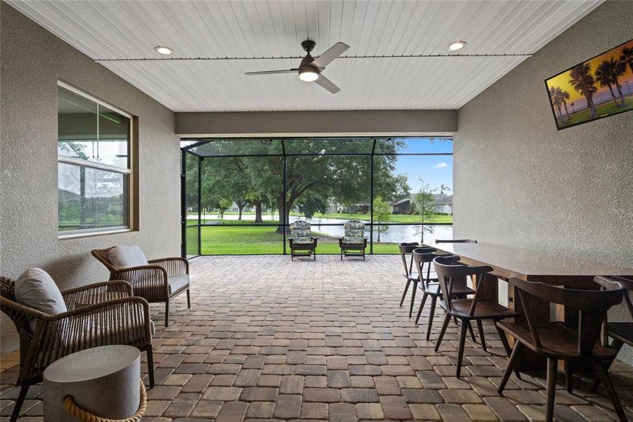 Patio features a Ceiling Fan, Recessed Lighting and decorative pavers
