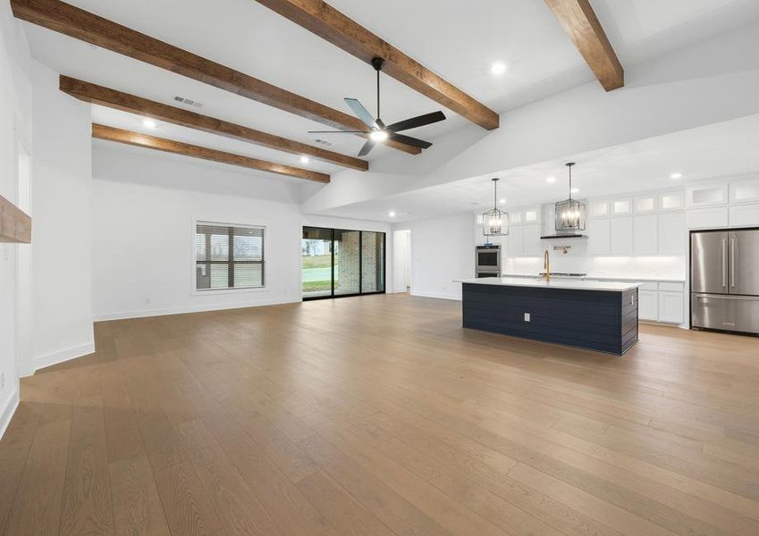 The open layout connects the kitchen with the breakfast area and family room.