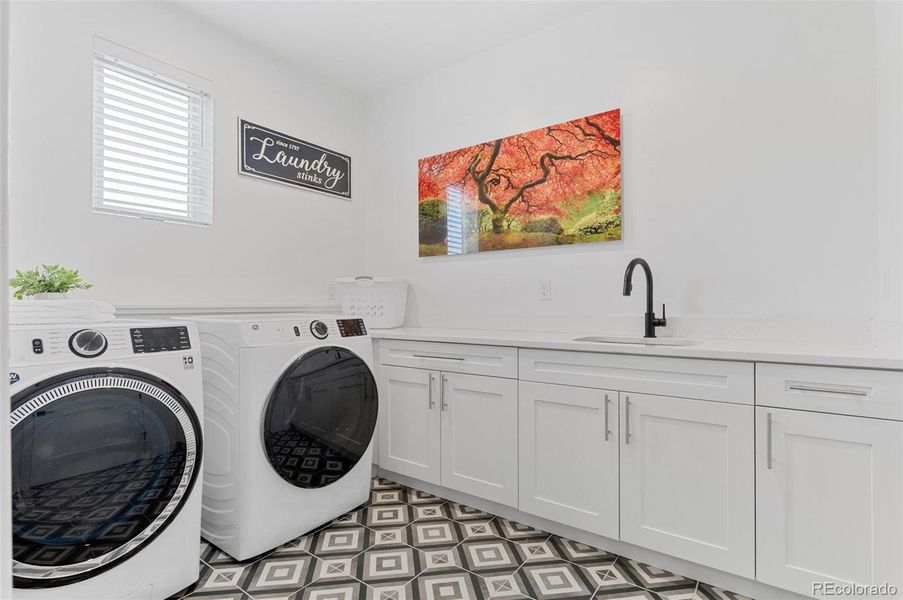 Laundry. Upstairs, adjacent to Master closet