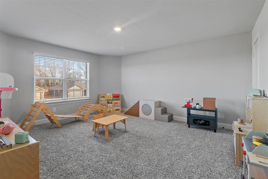 Playroom featuring carpet flooring