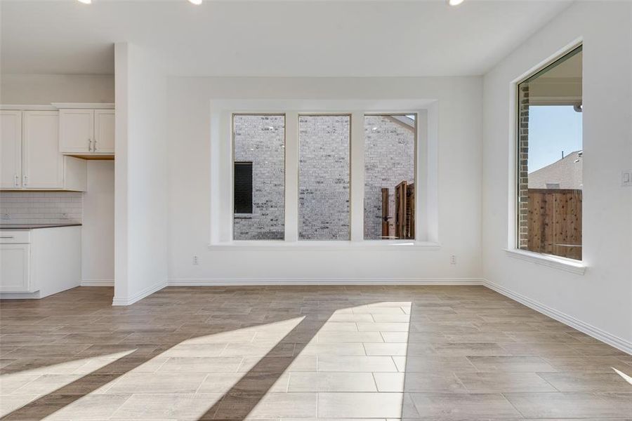 Unfurnished living room featuring light hardwood / wood-style flooring