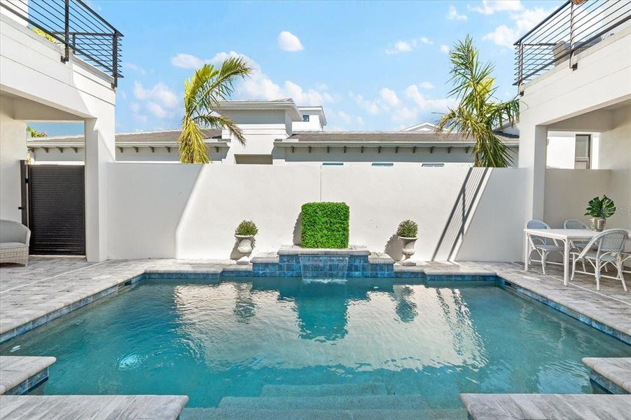 Stunning courtyard pool to get sun all day.