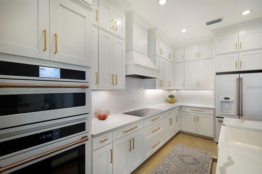 Fantastic cabinet space, quartz countertops and upgraded appliance package!