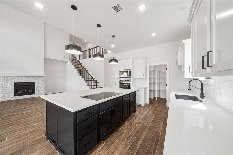 Kitchen with upgraded pendant lighting