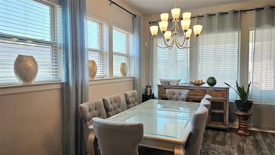 Dining area featuring a notable chandelier