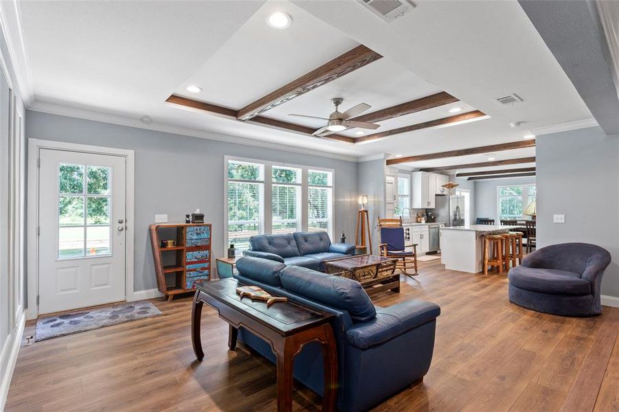 Another view of the Living room shows how open the space is and the easy access to the Kitchen.