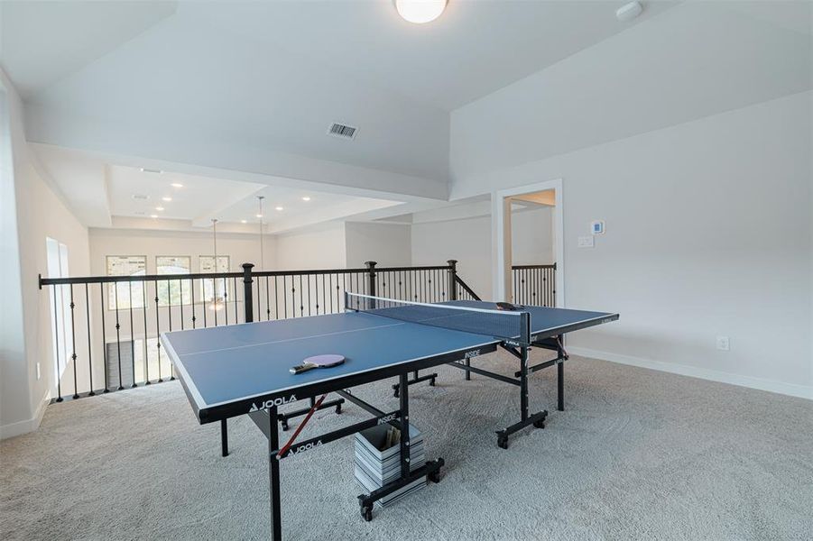 Game room upstairs is spacious and open to the downstairs.