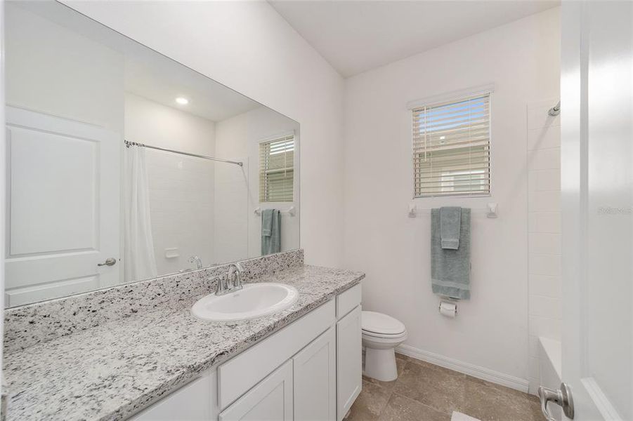 Guest Bath, Granite counters and tub shower