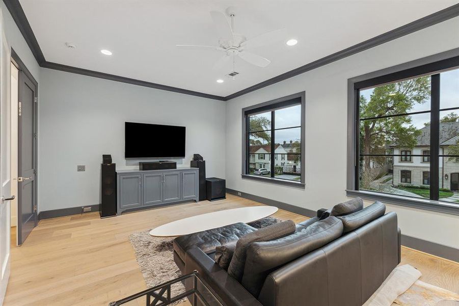 The Game Room boasts French oak wood floors, crown molding, recessed lighting, and a ceiling fan. It is equipped with built-in speakers and a complete audio and visual system for entertainment enjoyment!You will love the view from this room!