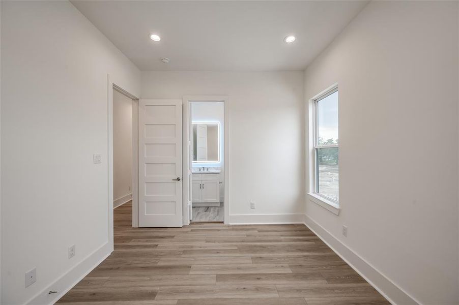 Secondary bedroom on the third floor.