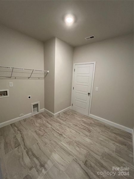 Spacious and easily accessible laundry room