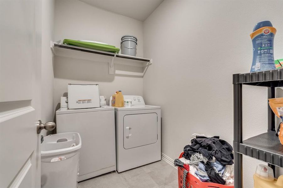 Laundry room with separate washer and dryer