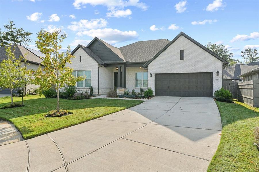 A long driveway that’s perfect for welcoming guests this home is as inviting as it is stylish.