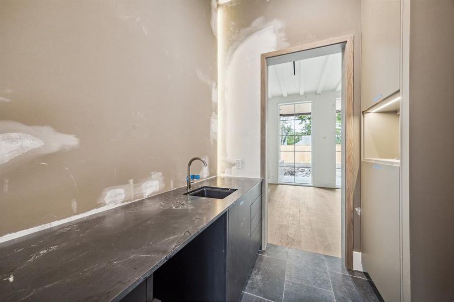 Wet Bar and Wine Room both accessible from the Libary and Dining Room.