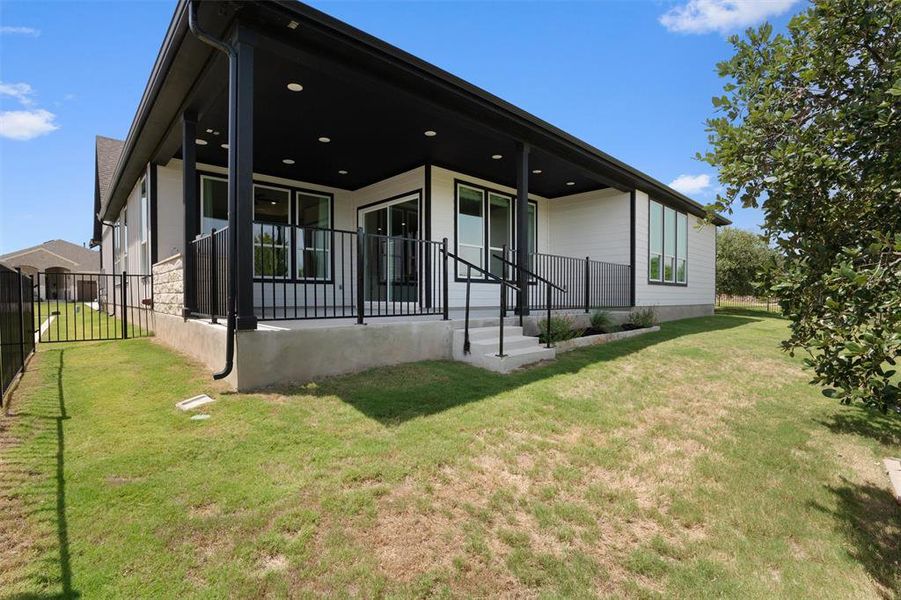 Extended and upgraded back patio w/ outdoor kitchen