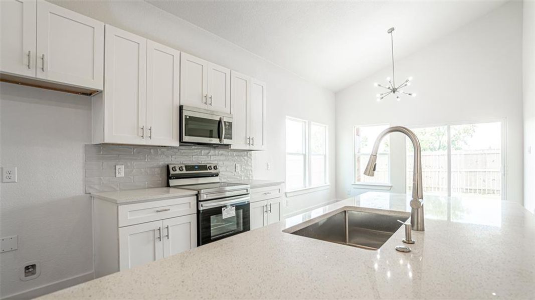 Kitchen with sink in island