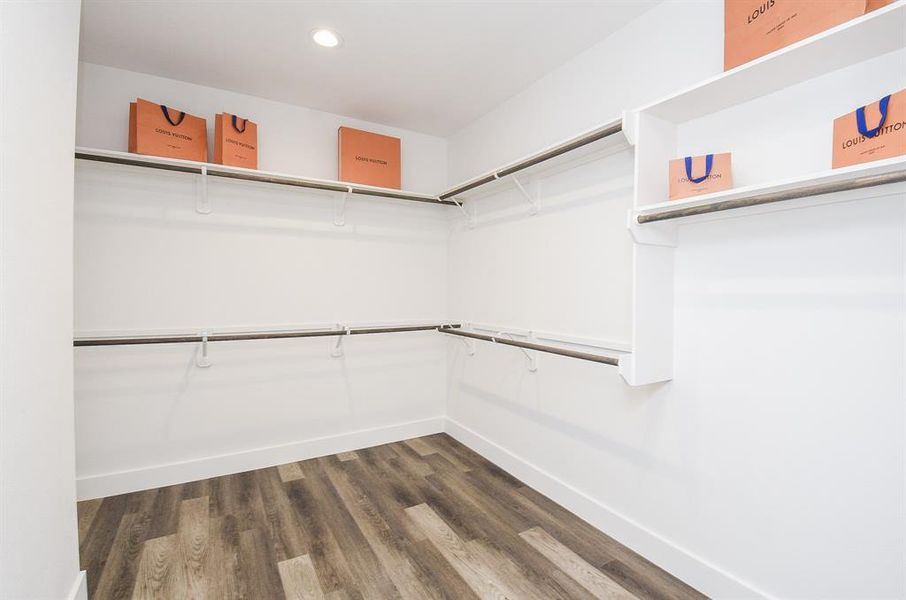 Wow. One can never have too many closets --- especially like this primary ensuite walk-in!