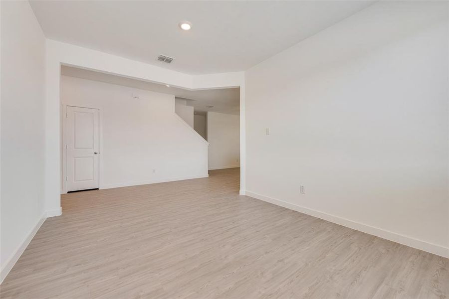 Spare room featuring light hardwood / wood-style flooring