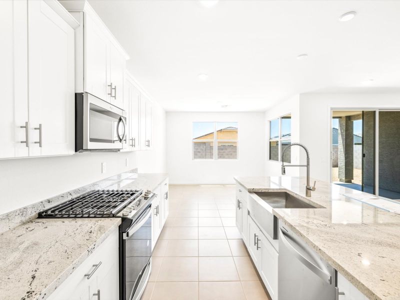 Kitchen modeled in Onyx floorplan at Paloma Creek