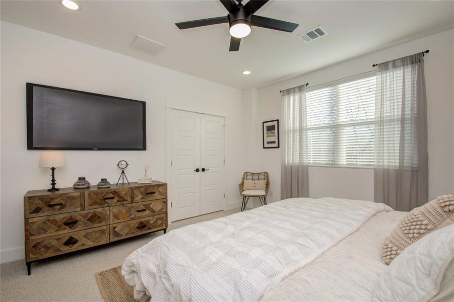 Spacious and elegant primary bedroom! Photos from another community by the same builder, FINISHES & FLOOR PLAN MAY VARY! Ceiling fans are not included!