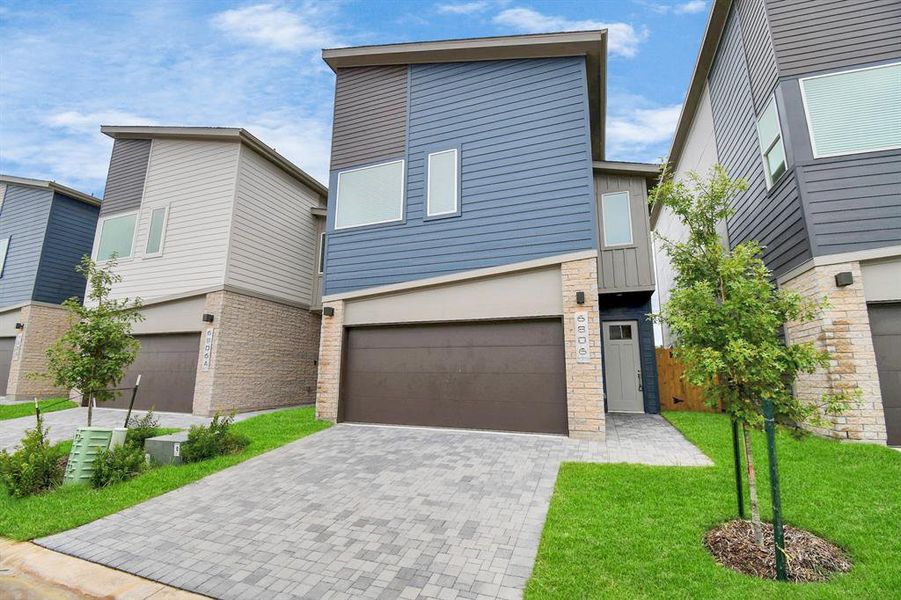 Double wide driveway and 2 car garage