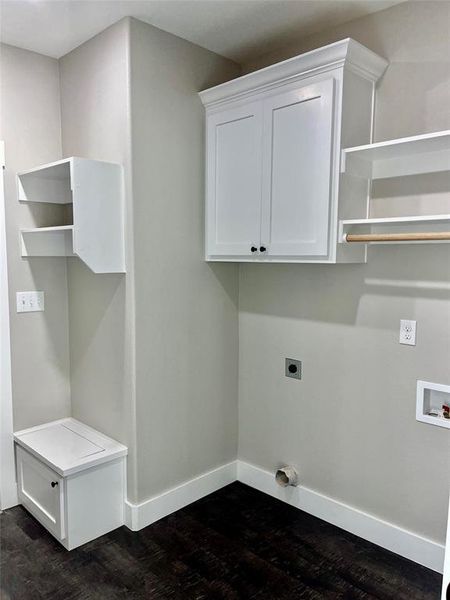 Laundry area featuring hookup for an electric dryer, dark wood-type flooring, and washer hookup