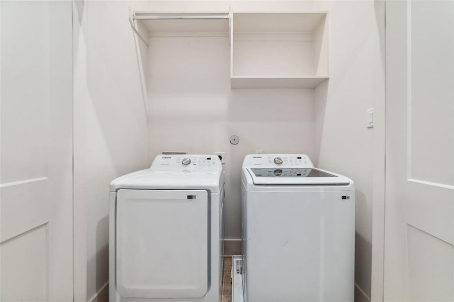 Conveniently Located Laundry Room Is Great For That Extra Storage As Well. Shelving Keeps Everything Organized And Easy To Get To