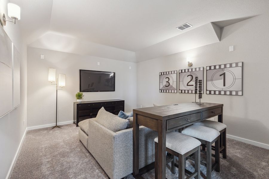 Media room in the Wimbledon home plan by Trophy Signature Homes – REPRESENTATIVE PHOTO