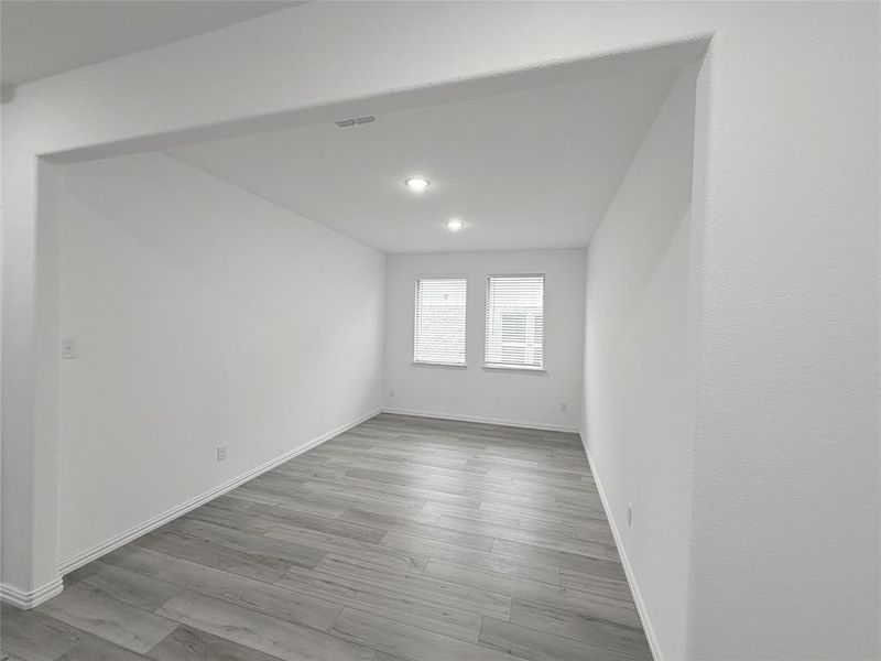 Spare room featuring light hardwood / wood-style flooring